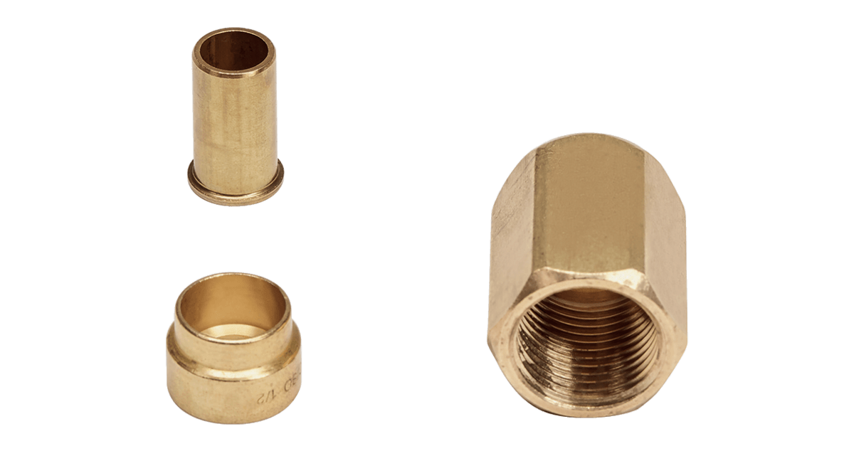 Set of three brass fittings including a nut and two adapters, used for plumbing and HVAC applications.